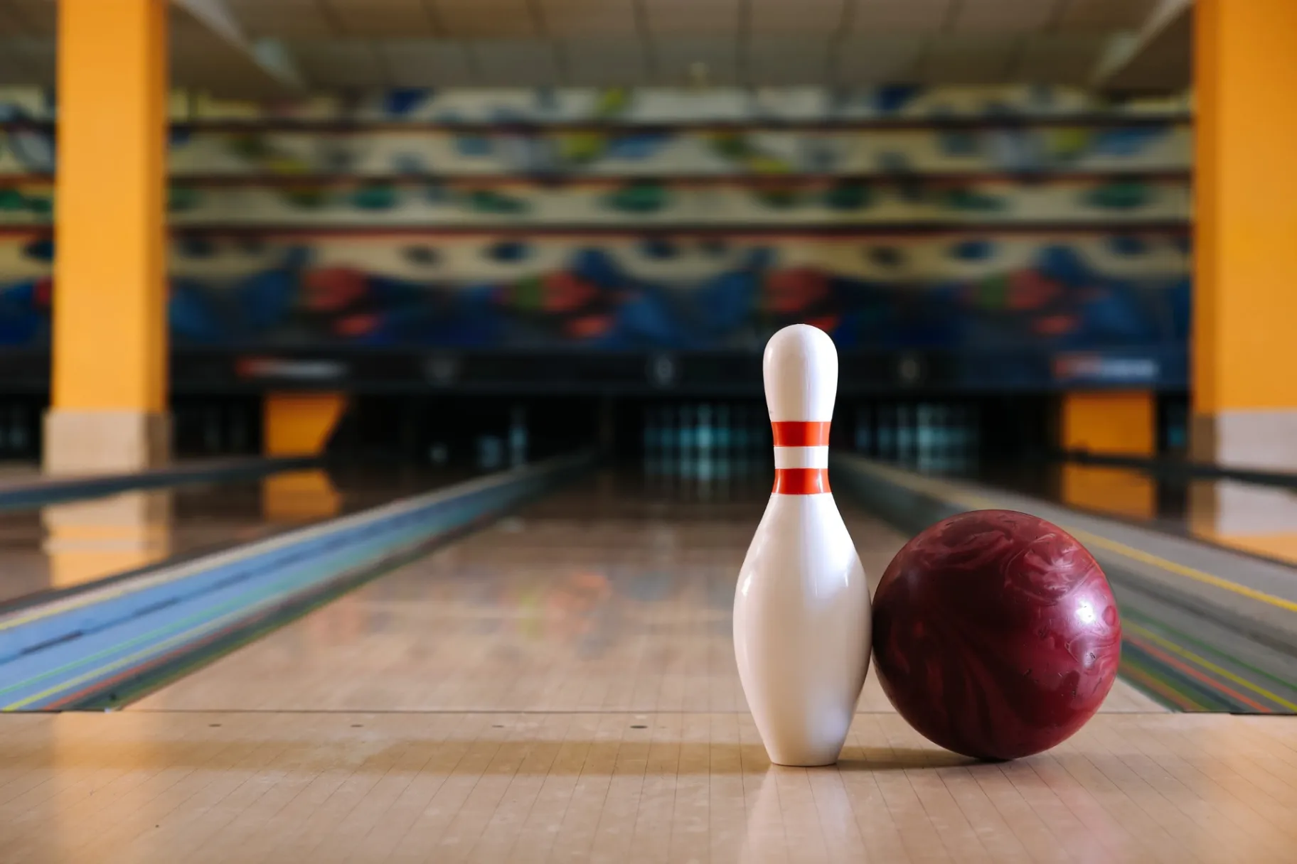 Pin and ball on floor in bowling club